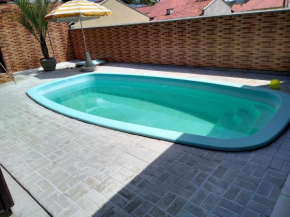 Casa com Piscina